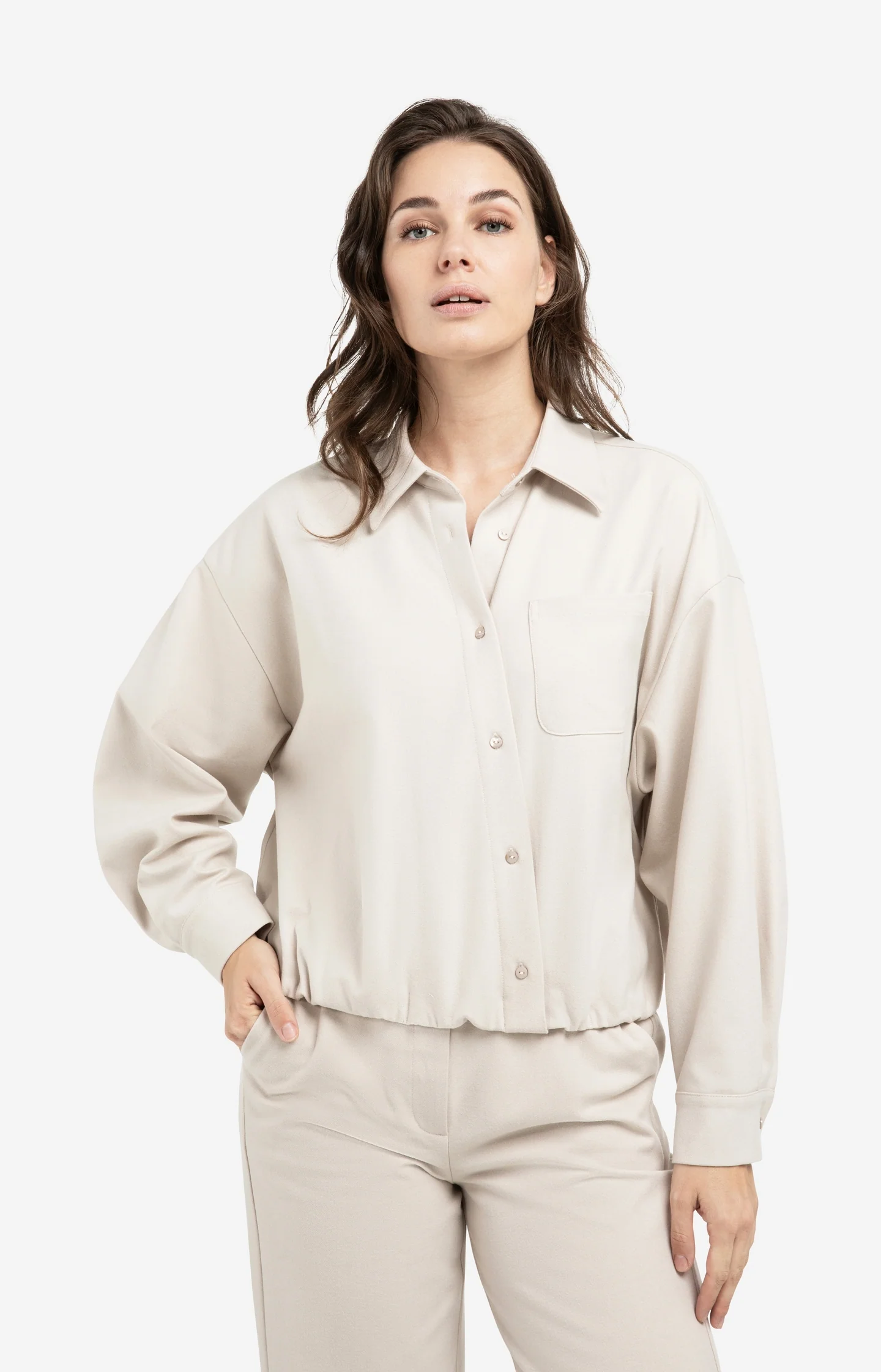 Blouse with asymmetric button placket and elastic hem - Image 3