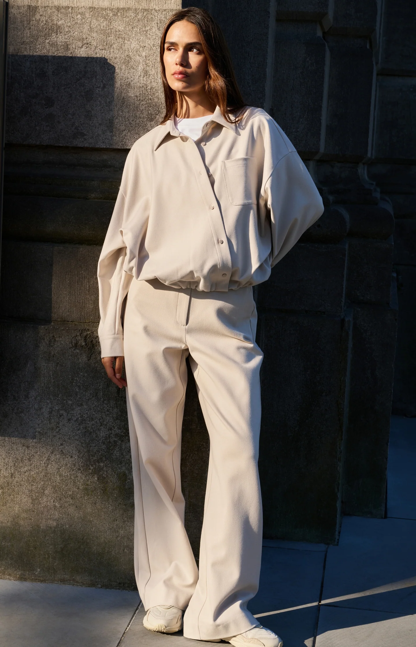 Blouse with asymmetric button placket and elastic hem - Image 7