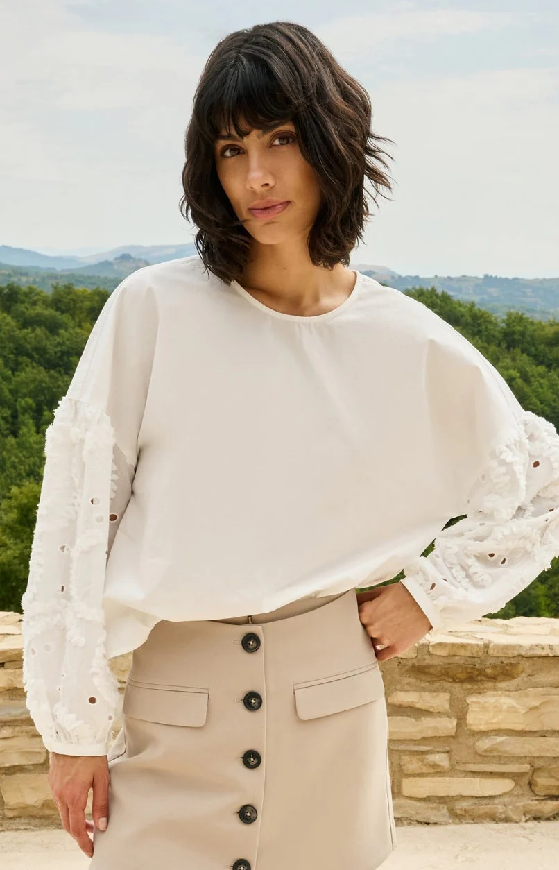 Blouse with embroidered sleeves and round neckline