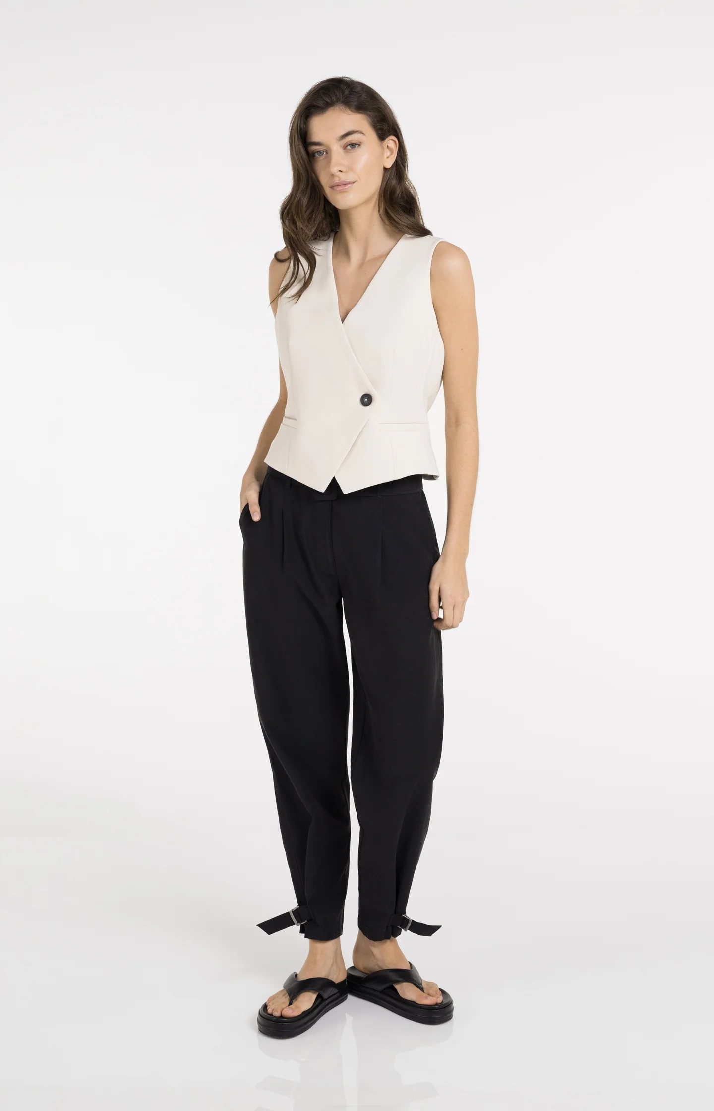 High waist trousers with strap details at the bottom hem - Image 10
