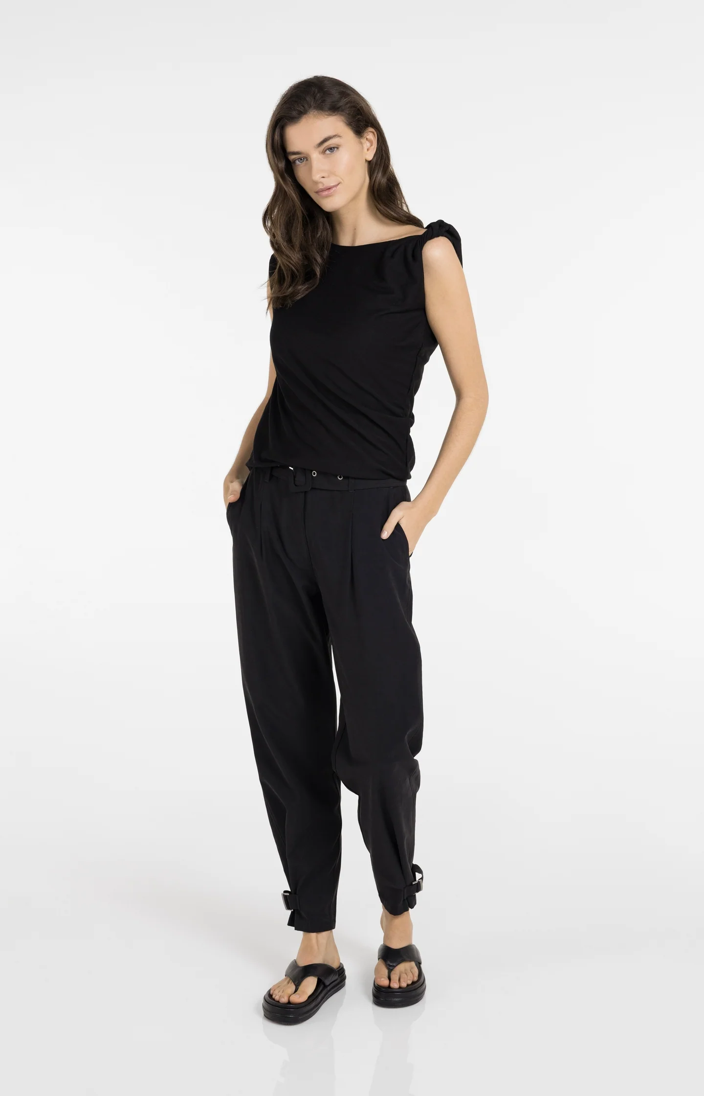 High waist trousers with strap details at the bottom hem - Image 9