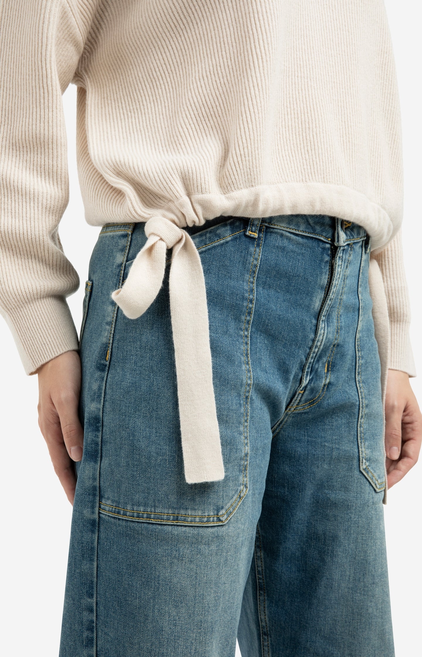 Knitted sweater with tie details at the hem - Image 4