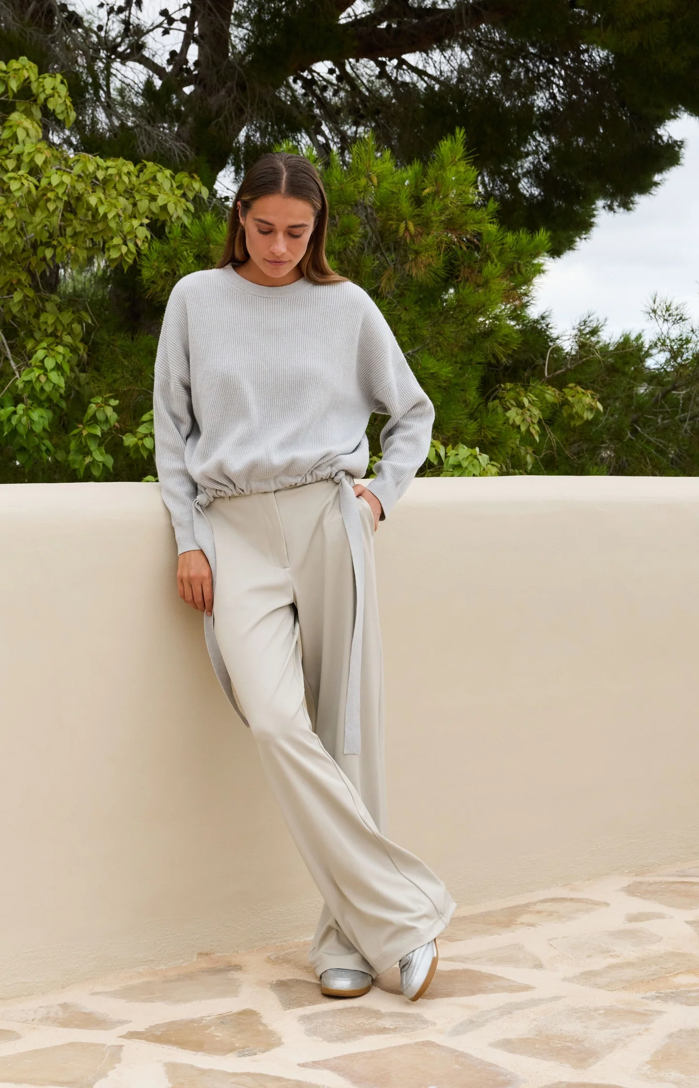 Knitted sweater with tie details at the hem - Image 6