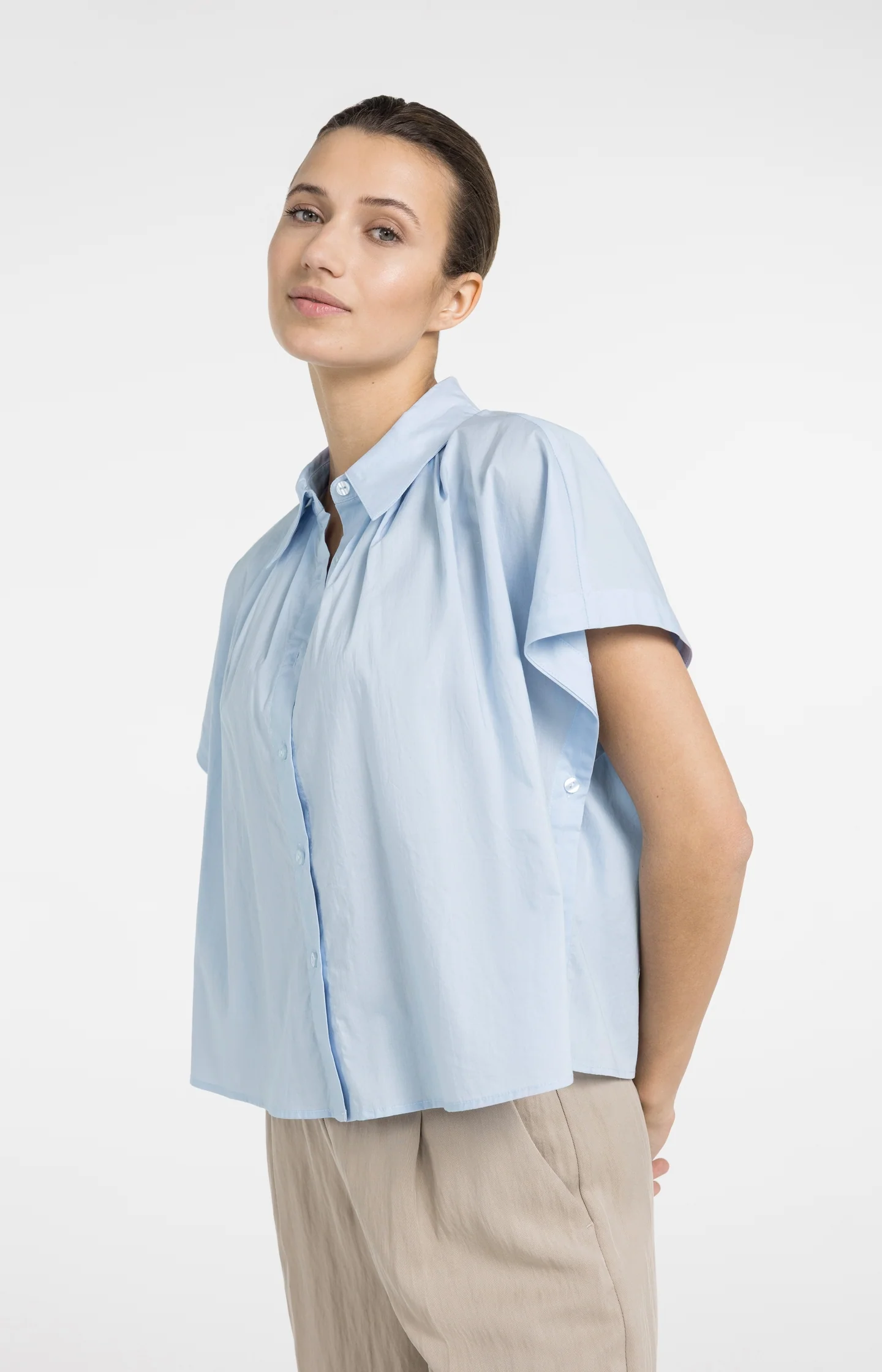 Sleeveless blouse with button details - Image 4