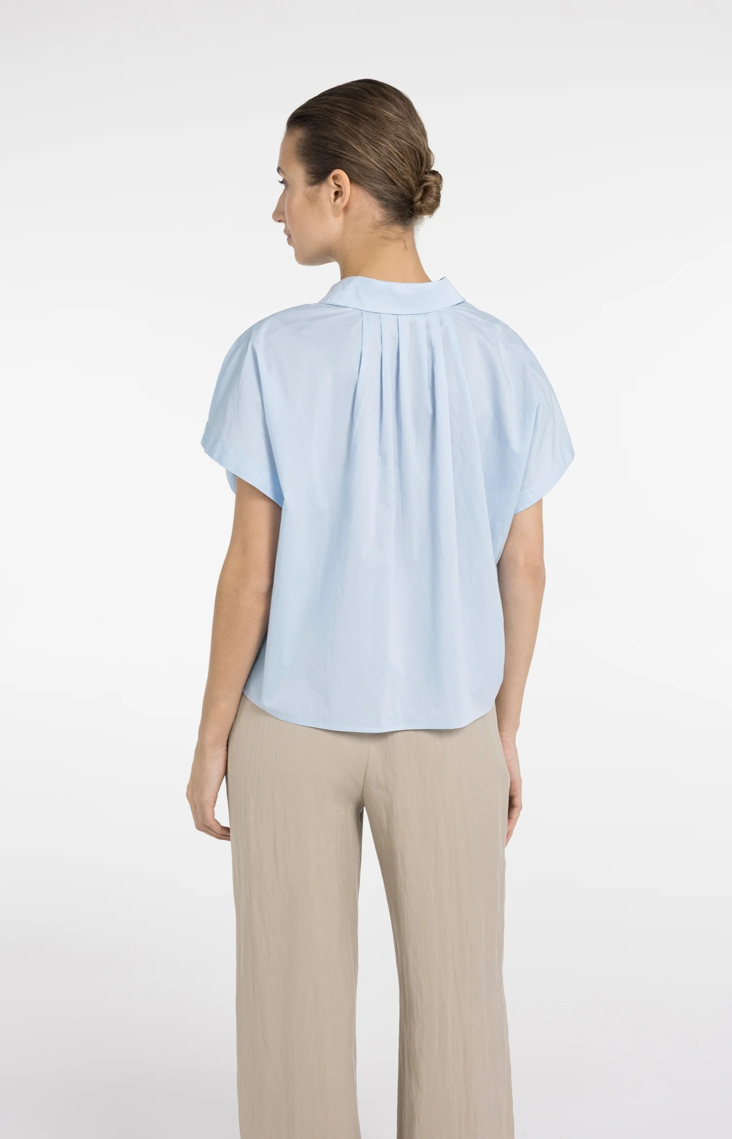 Sleeveless blouse with button details - Image 5