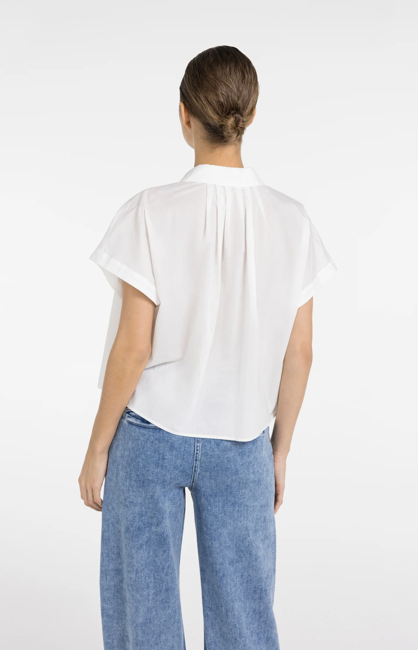 Sleeveless blouse with button details - Image 4