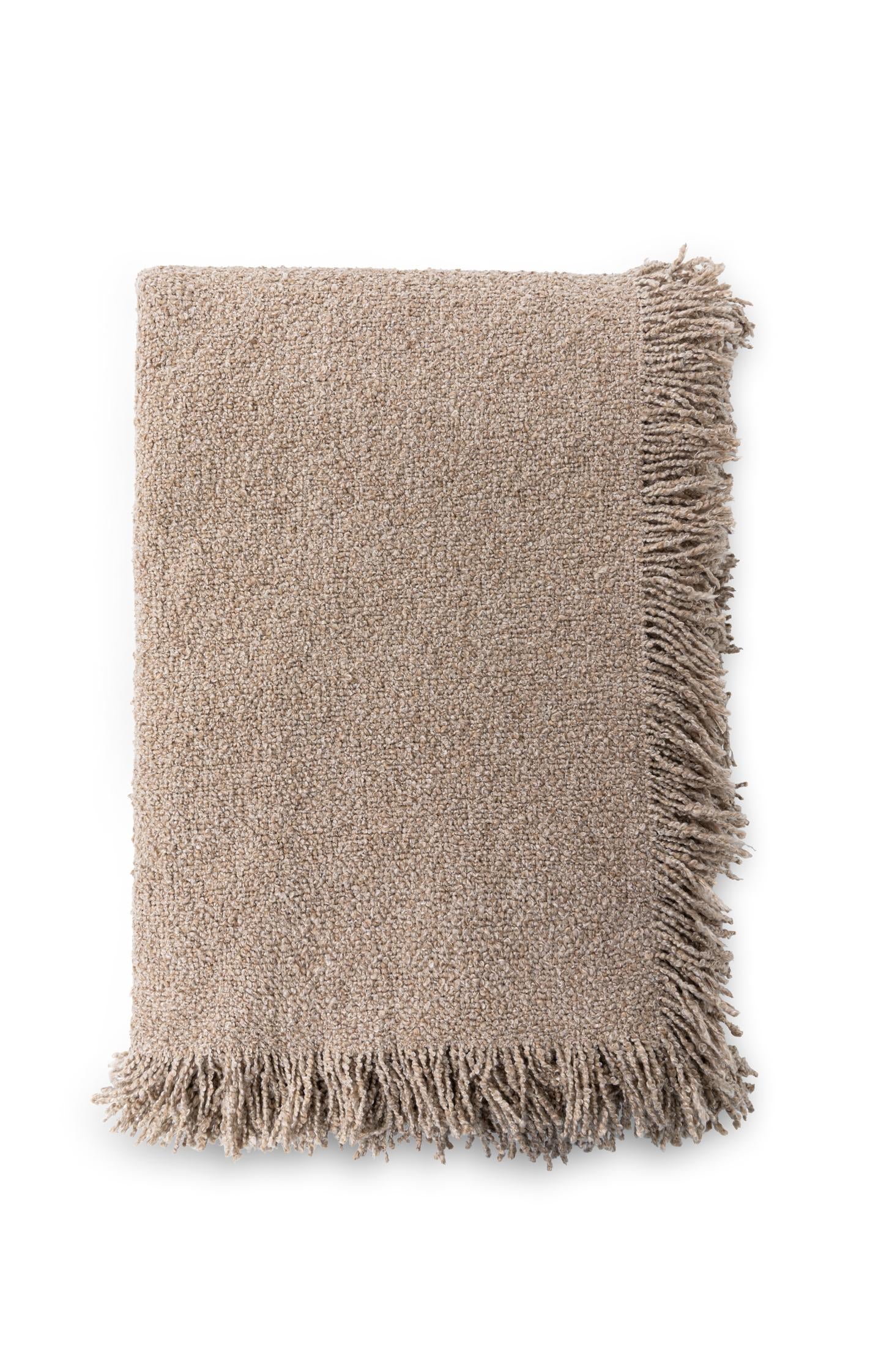 Soft throw with fringes