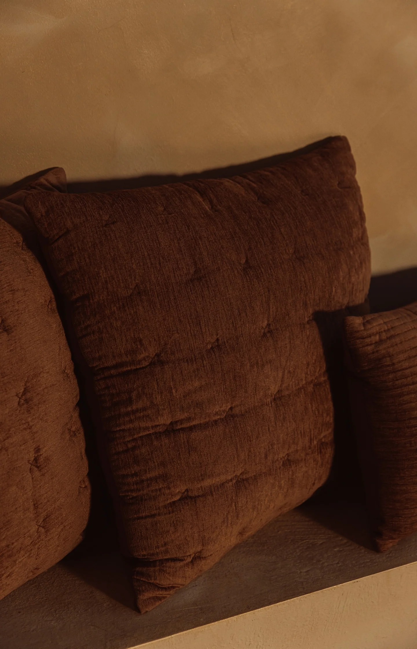 Velvet cushion with quilted details